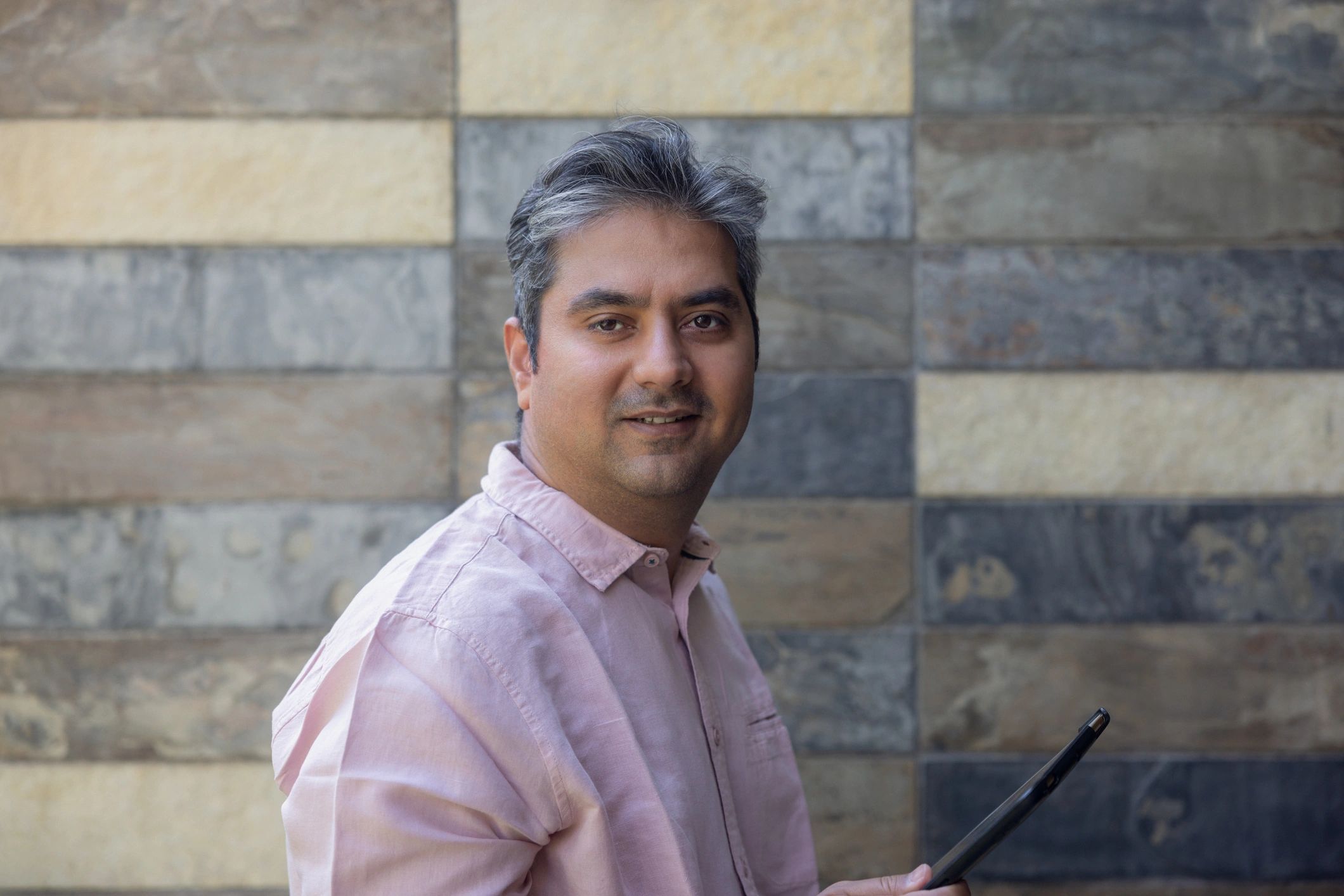 Indian presenter representing community stories